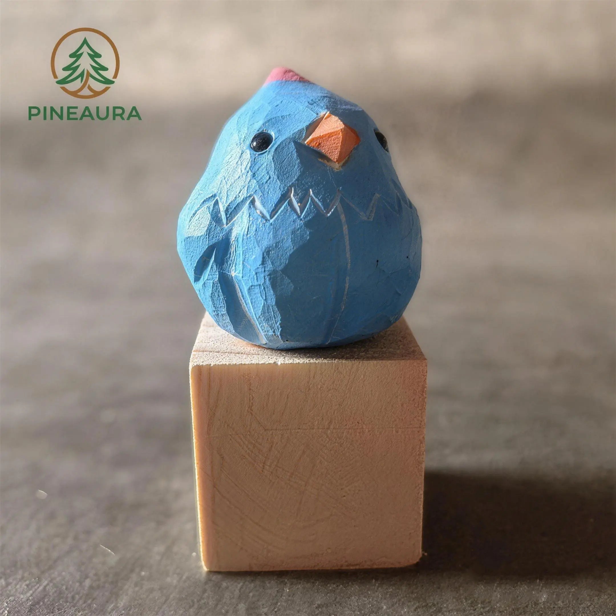A Wooden Blue Bird Sculpture Named Blueberry Sky