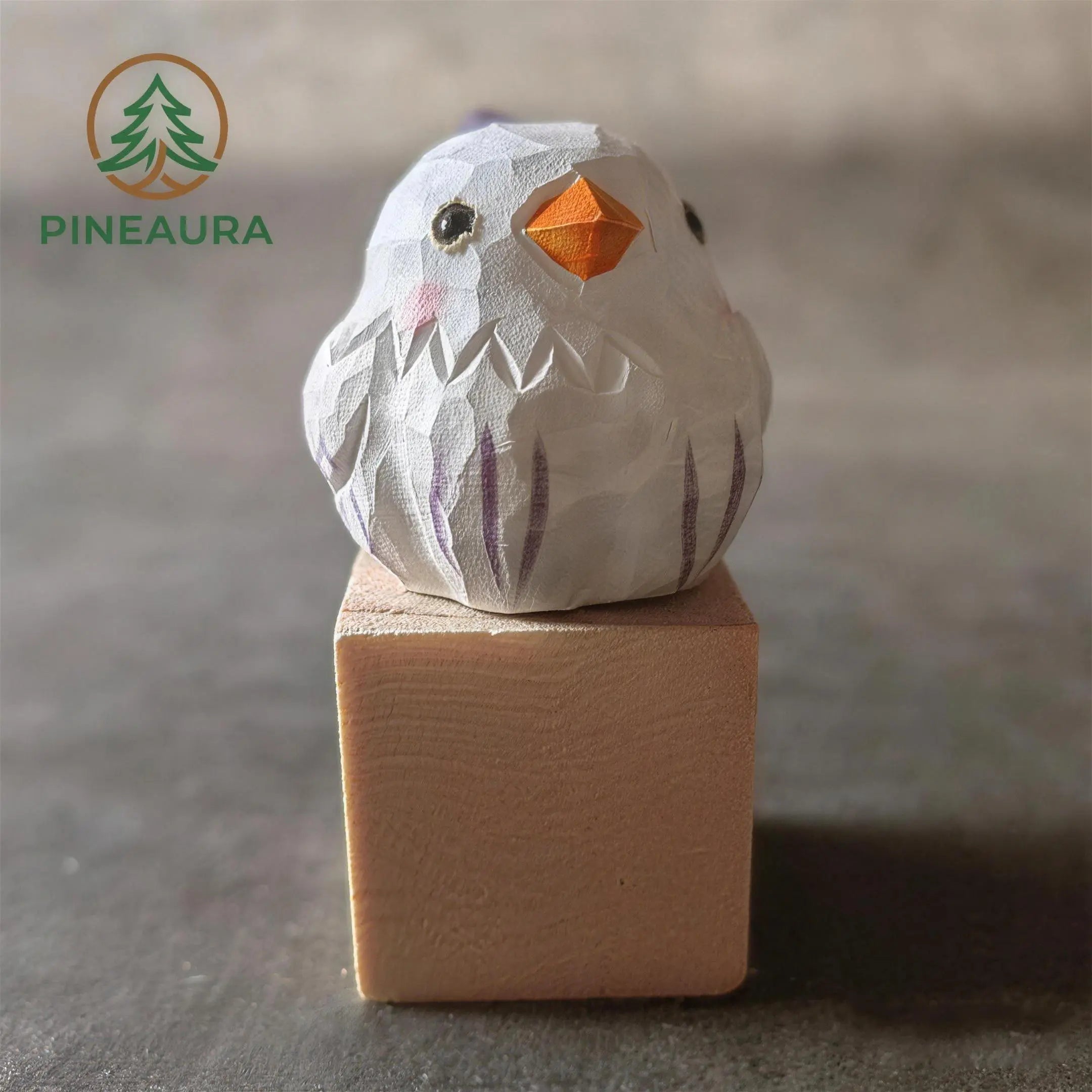 A Wooden Blue Bird Sculpture Named Snowy Puff